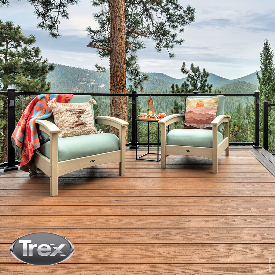 Evergreen, Colorado Trex® deck featuring glass railings, steel framing, custom spiral stairs, LED lighting