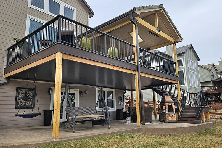 Trex Deck with Roof and metal railing built with steel framing in Littleton, Colorado