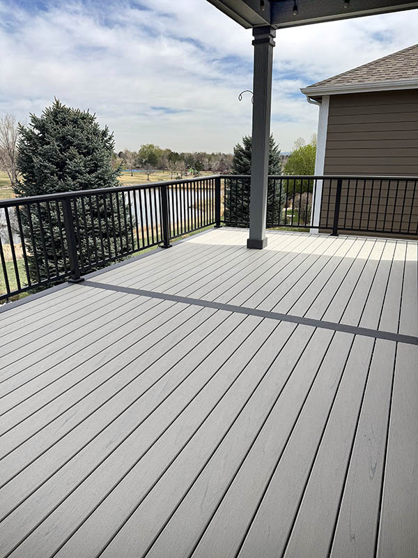 Trex deck with black aluminum railing and steel-framing 