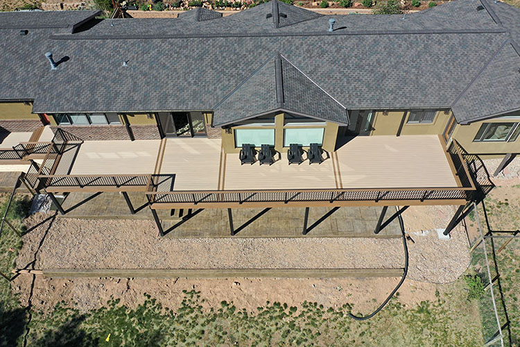 Conifer, CO custom built Trex Deck with black aluminum railing and steel framing - drone shot.